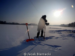 Ice diving by Jacek Biernacki 